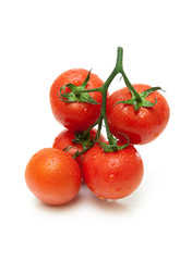 ripe tomatoes closeup on white background