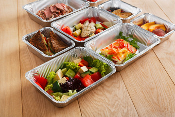 Healthy food in boxes, diet concept.