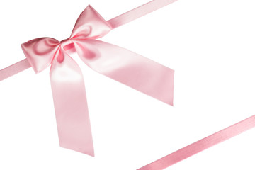 Pink ribbon bow on white