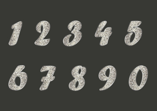 Set of light golden numbers on dark grey background