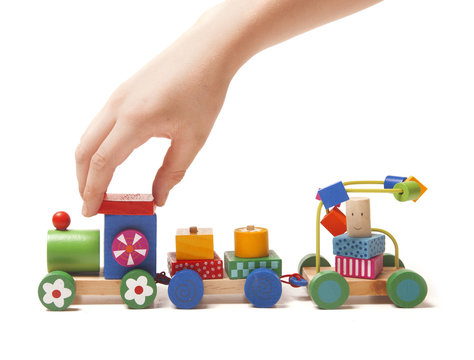 Wooden train puzzle with coaches