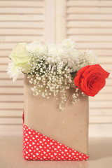 Flowers in paper bag