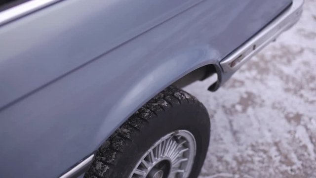 Сamera moves to the wing on the car wheel