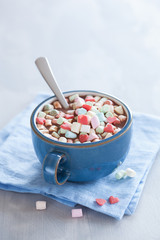hot chocolate with marshmallow and red hearts