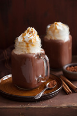 hot chocolate with whipped cream caramel in mason jar