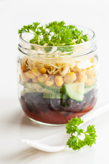 vegetarian bean sweetcorn cheese salad in mason jar