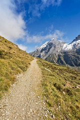 Fototapeta na wymiar Mountain hiking trail in swiss alps