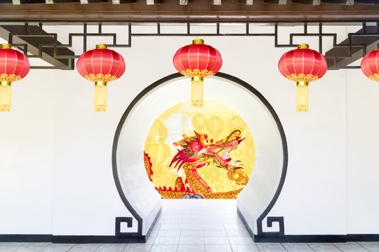 Moon Gate In Chinese Garden , Dragon