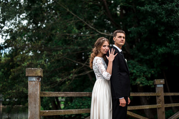 happy bride and groom at a park on their wedding day