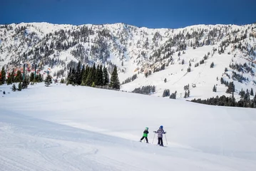 Foto op Canvas Children exploring a ski mountain in Montana. © melissadoar