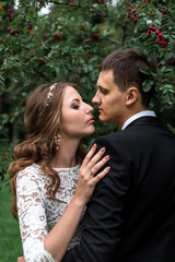 happy bride and groom at a park on their wedding day