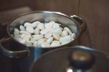 Raw bean in iron pot 