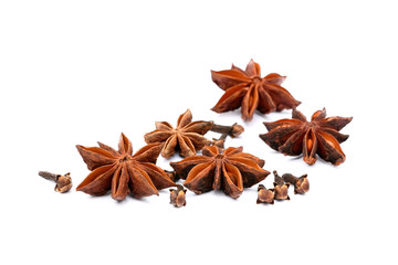 Aromatic star anise, cloves isolated on white background
