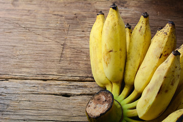 Fototapeta premium Ripe bananas on wooden table