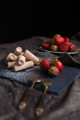 Strawberry cut snack filling strawberry cream decorated with fresh strawberry fruit.