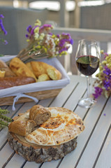 Shabbat shalom, bread and a glass of wine. On the table in the terrace.