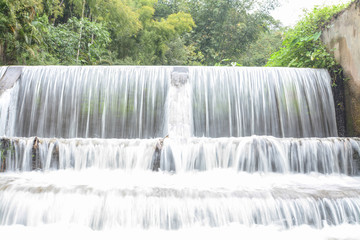Mae Kampong waterfall and river in green forest, in Chiang Mai, Thailand