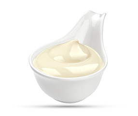Mayonnaise sauce in bowl isolated on white background with clipping path