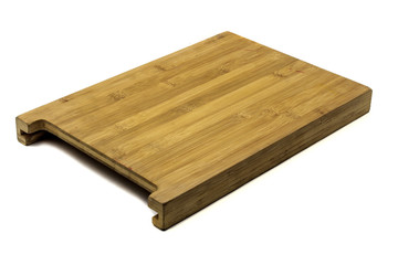 A wooden cutting board on a white background
