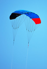 Empty parachute in the sky. Space for text.