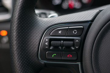 Call buttons on car steering wheel.