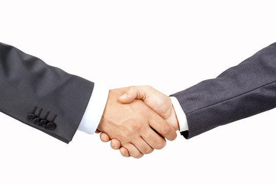 Hands Of Two Businessmen Shaking Hands Isolated On White Background
