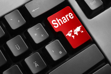 keyboard with red enter key share internet
