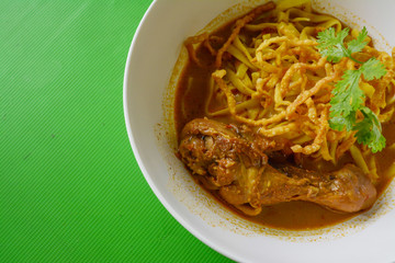 Curried Noodle Soup (Khao soi) with chicken , Traditional of Northern Thai food.