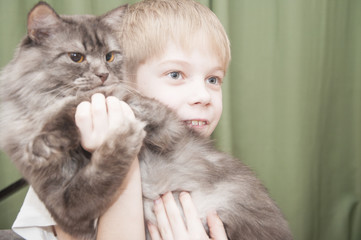 child with kitten