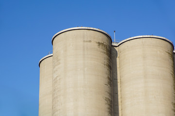 Exterior view of a cement factory, Silos for storage