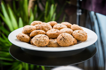 cookies with chocolate and raisins on a plate