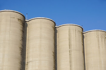 Exterior view of a cement factory, Silos for storage