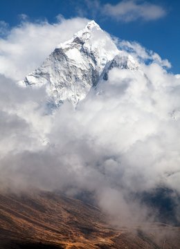 Mount Ama Dablam within clouds, way to Everest base camp