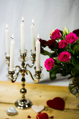 Rosen mit Kerzenständer