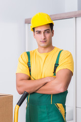 Transportation worker delivering boxes to house