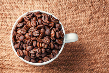 Coffee beans on wood background
