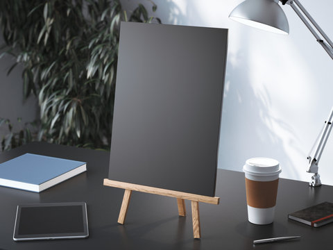 Wooden easel with blank frame. 3d rendering