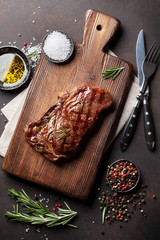 Grilled ribeye beef steak, herbs and spices
