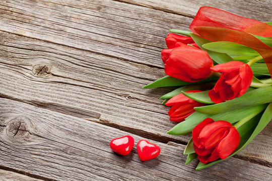 Red tulips and Valentine's day candy hearts