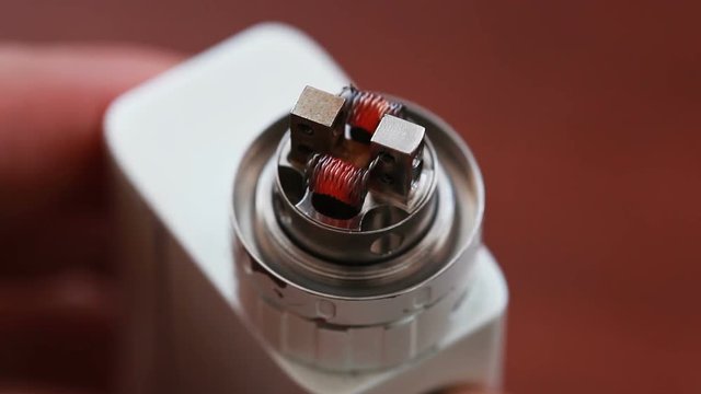 Macro video of burning spiral electronic cigarette