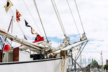 Bowsprit and rope coiled up of the sailing ship.