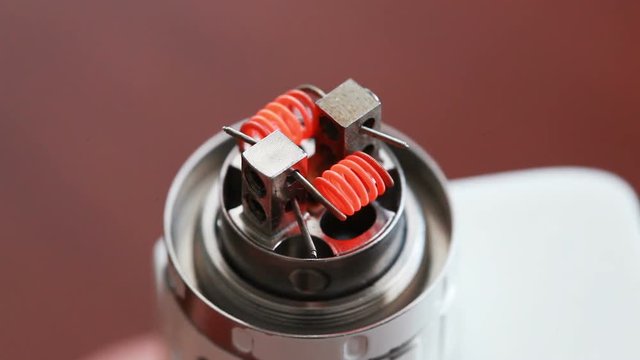 Macro video of burning spiral electronic cigarette