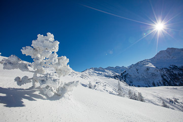 Winter mountains panorama with ski slopes.