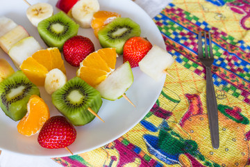 fruit skewers the concept of healthy eating.