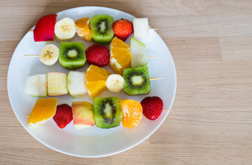 fruit skewers the concept of healthy eating.