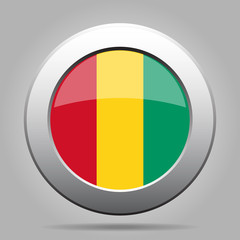 Flag of Guinea. Shiny metal gray round button.