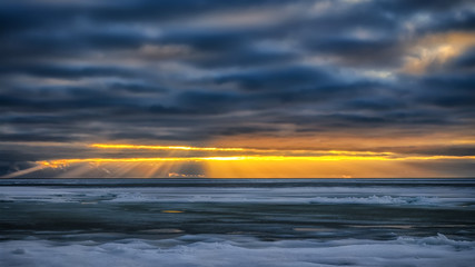 Fototapeta premium Colden winter sunset in beach
