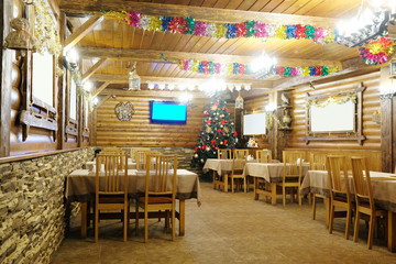 Interior of a cafe in a wooden house