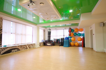 Interior of a fitness hall with punching bags