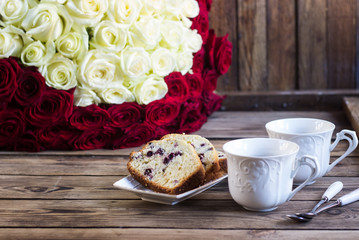 bouquet of red roses and coffee